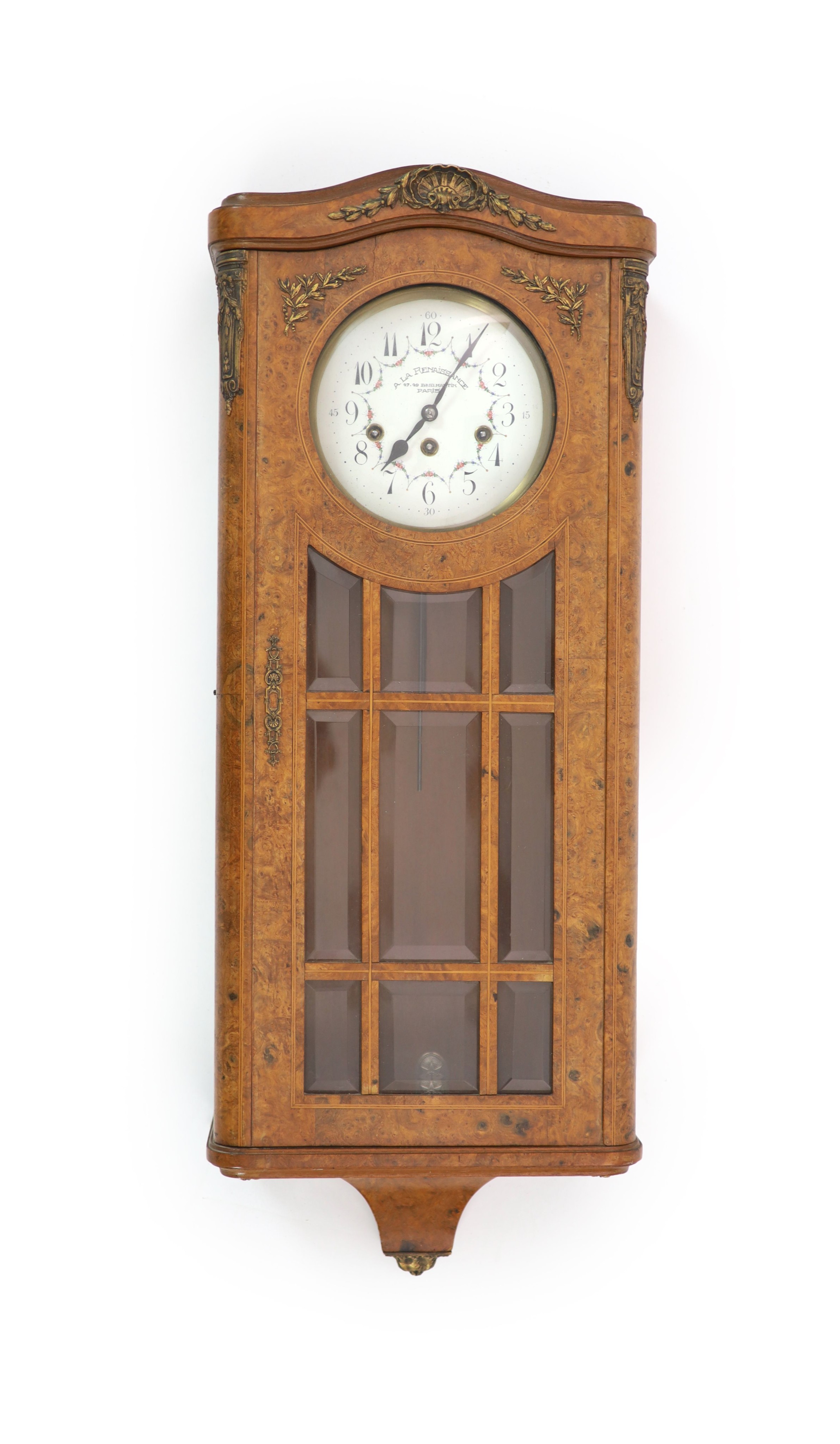 An early 20th century French burrwood cased wall clock with floral painted dial, signed A La Renaissance, 47, 49 Bd St Martin, Paris, H 86cm. W 33cm.